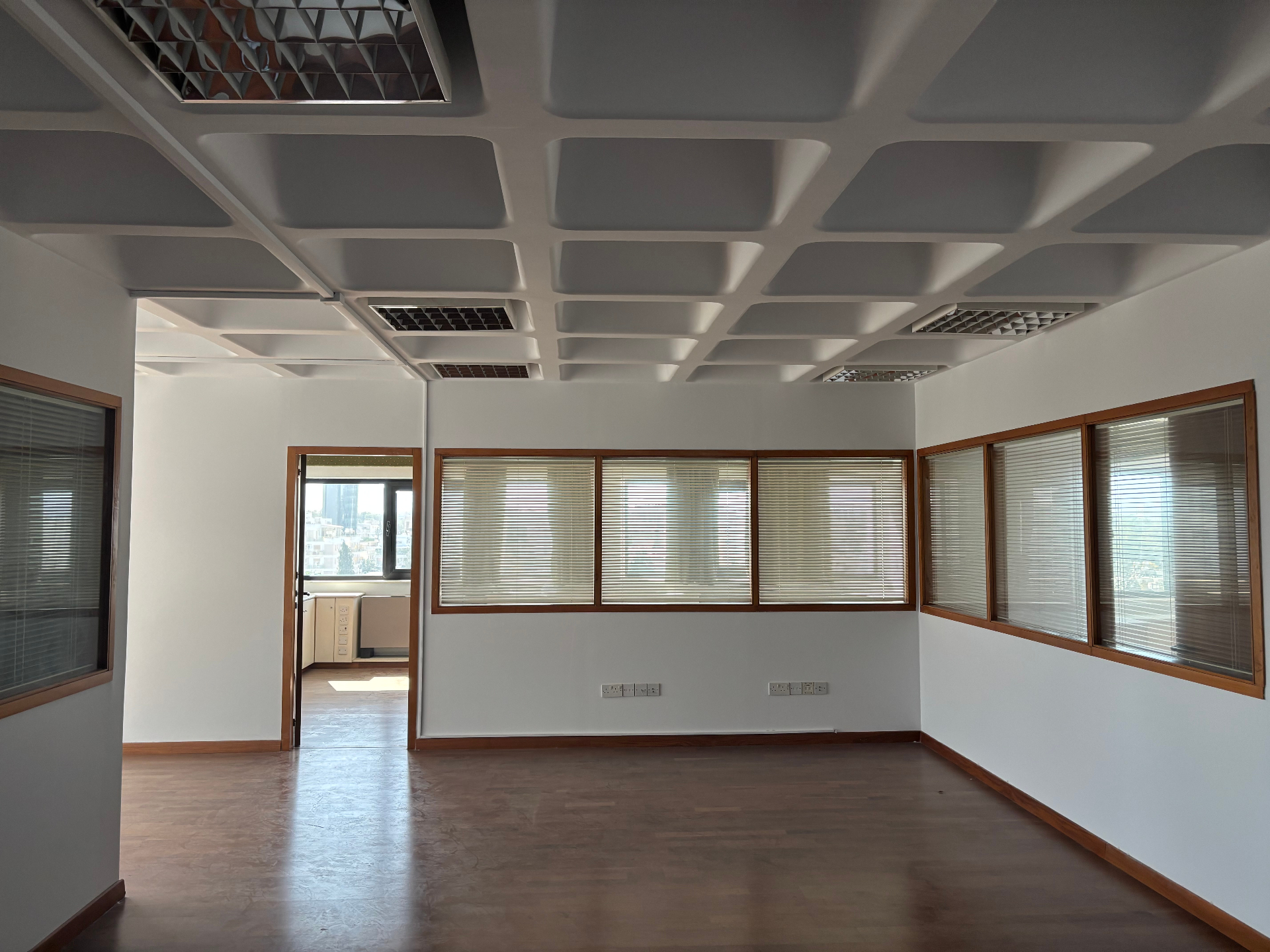 Open-plan partitioned office on the 6th floor
